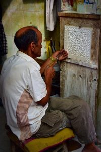 Picture of hand carving tiles in Marrakech Morocco