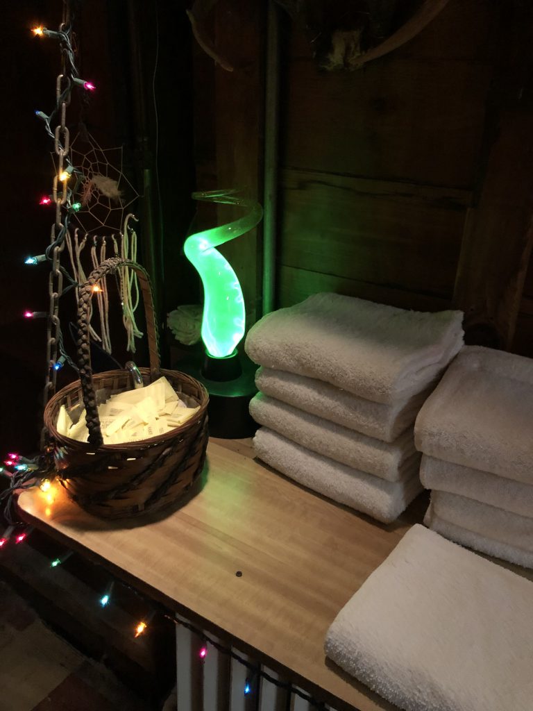 Picture of lava lamp and stack of towels
